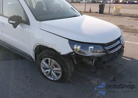 2014 Volkswagen Tiguan S from USA, damaged, VIN WVGAV3AX6EW533828